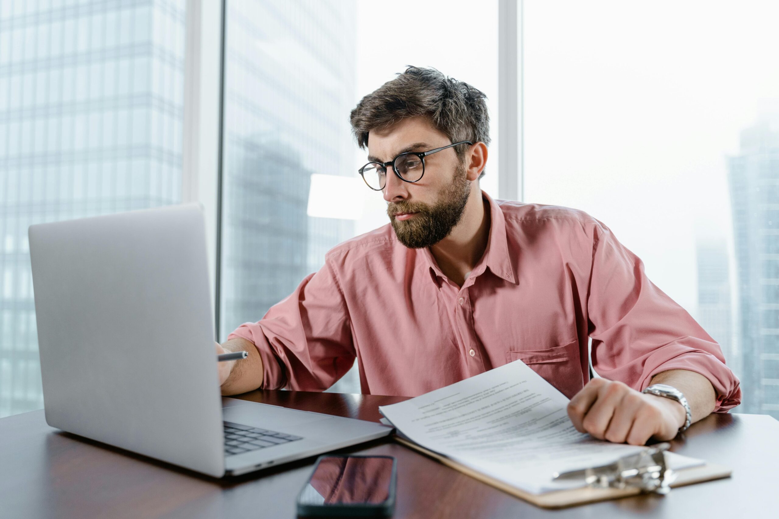 Corporate Tax advisor analyzing tax reports